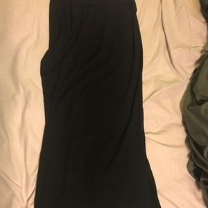 Long black skirt with small knee high slit